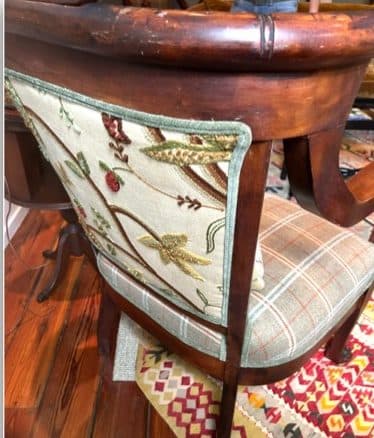 Detail of an upholstered dining chair in a Philadelphia brownstone.